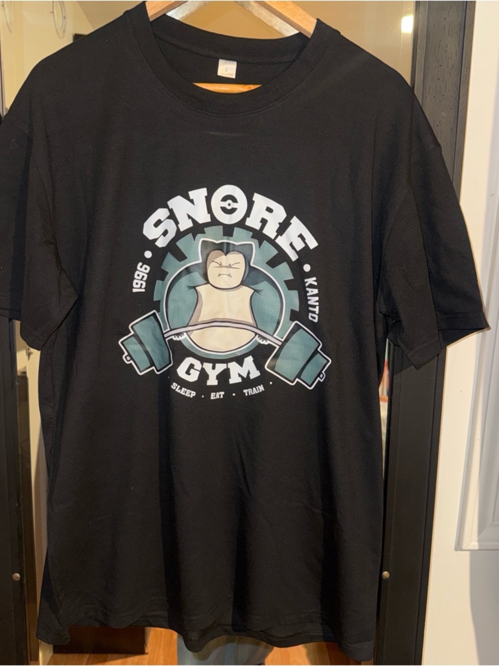 Pokemon Black Snorlax Gym Graphic Tank Top - Teal & White Print